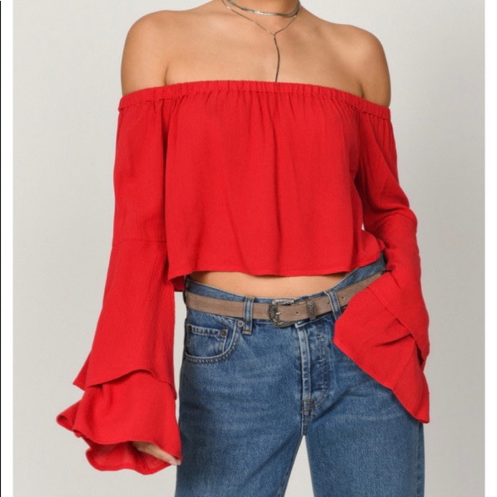 Flowy red crop top with flared sleeves